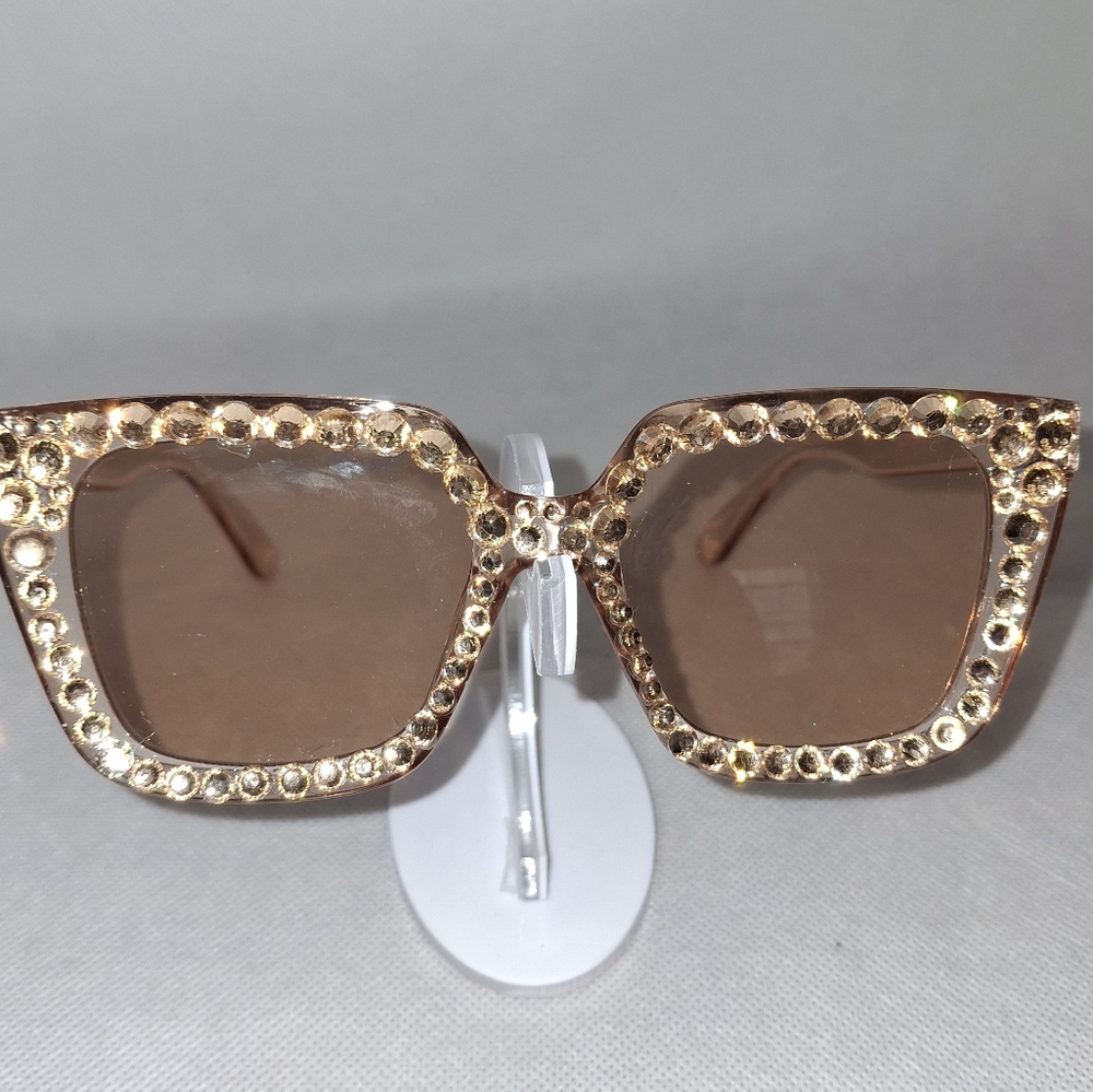 Elegant Gold-Toned Sunglasses With Rhinestone Embellished Frame.